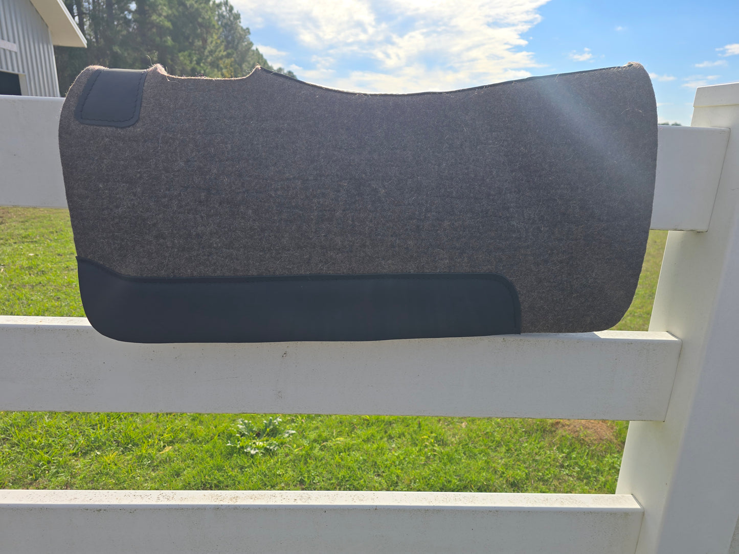 Grey wool pad with black leather