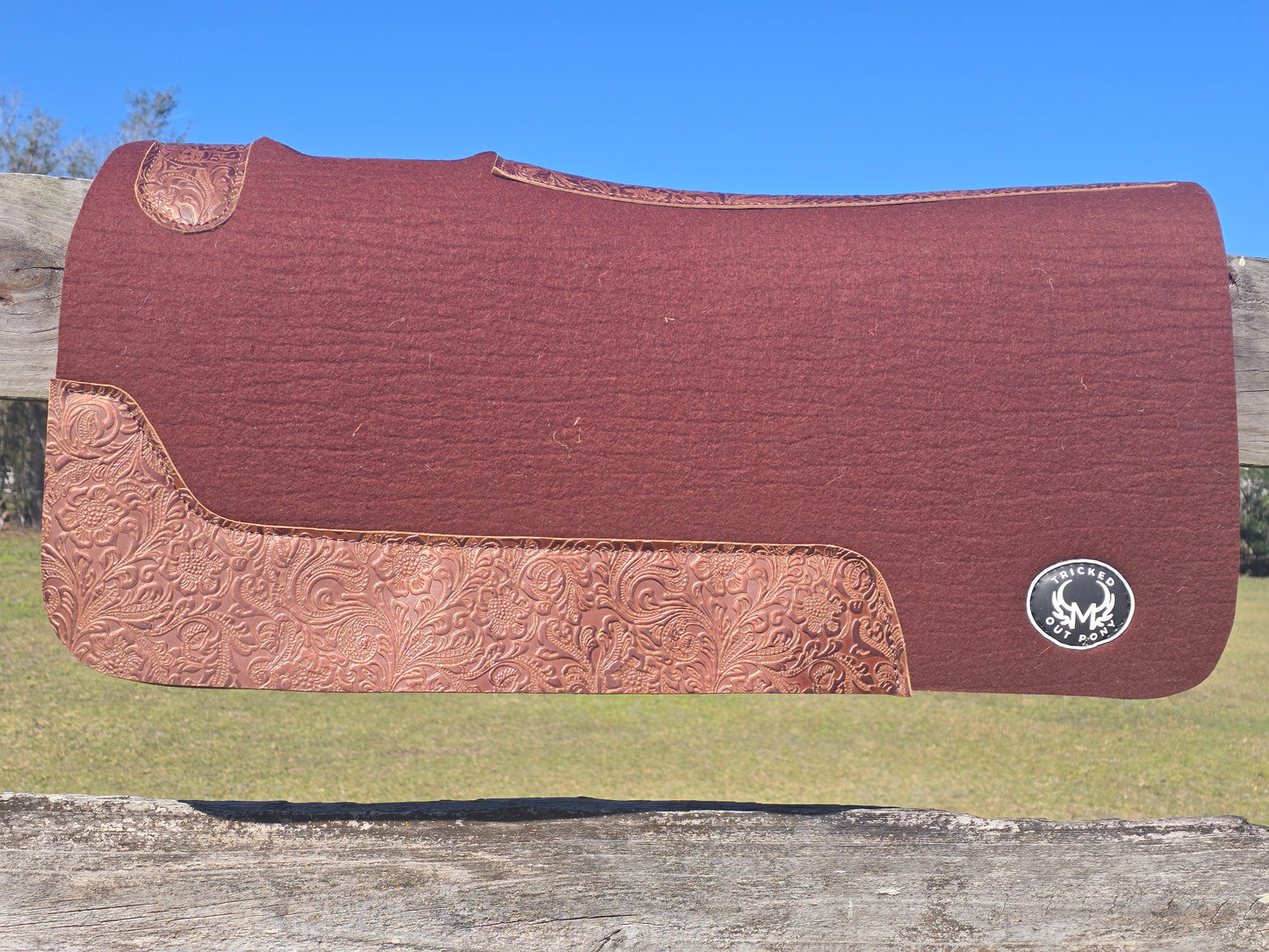 Brown pad with floral tooling
