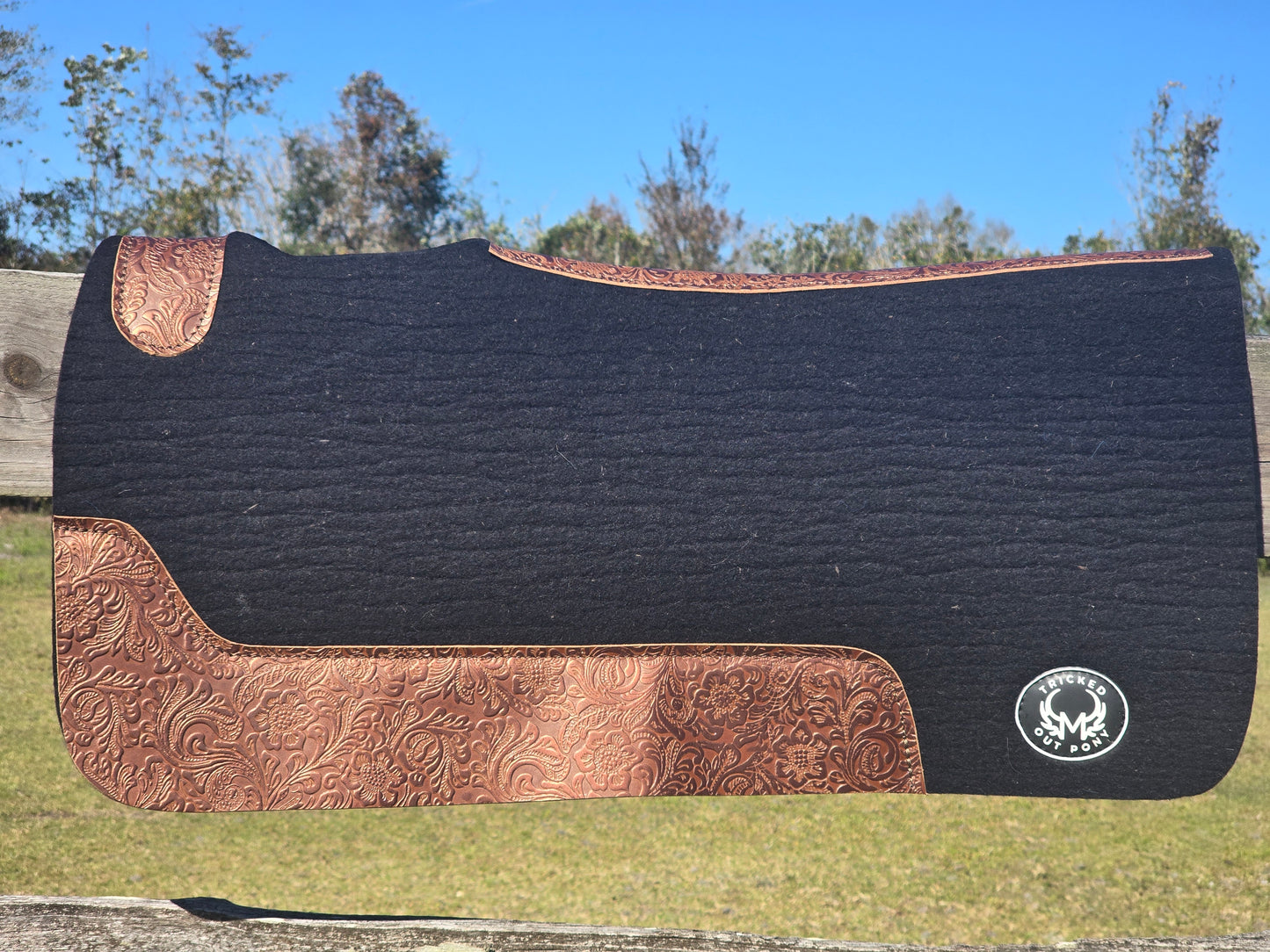 Black pad with floral tooling